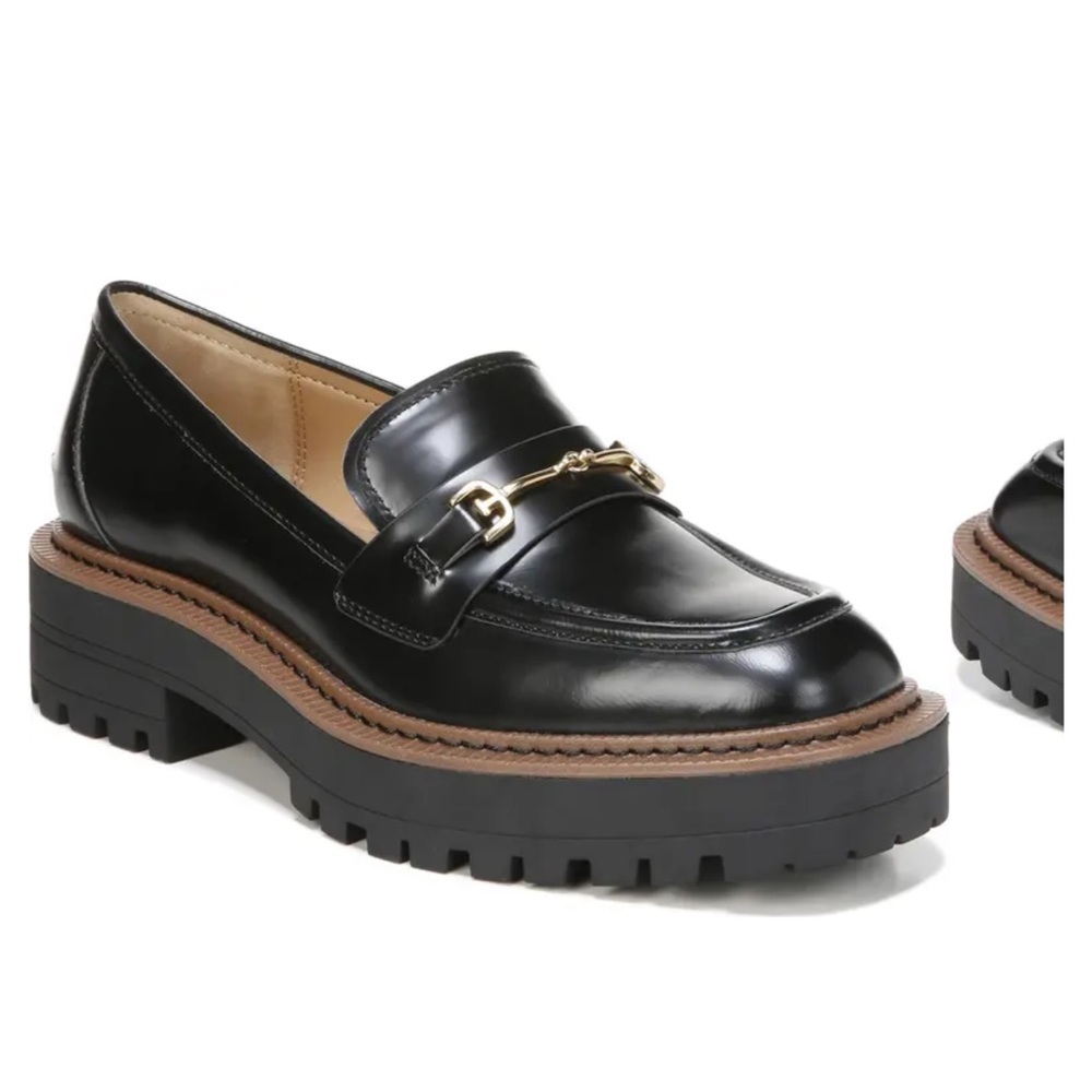 1 3/4" heel; 1 1/4" platform (size 8)
Leather upper/synthetic lining and sole